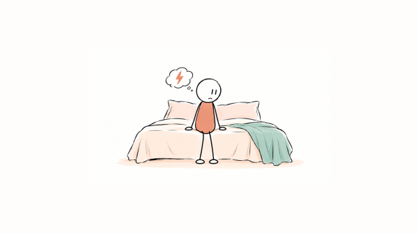 Personne assise sur un lit, inquiète à l’idée qu’une douleur intime puisse se reproduire.